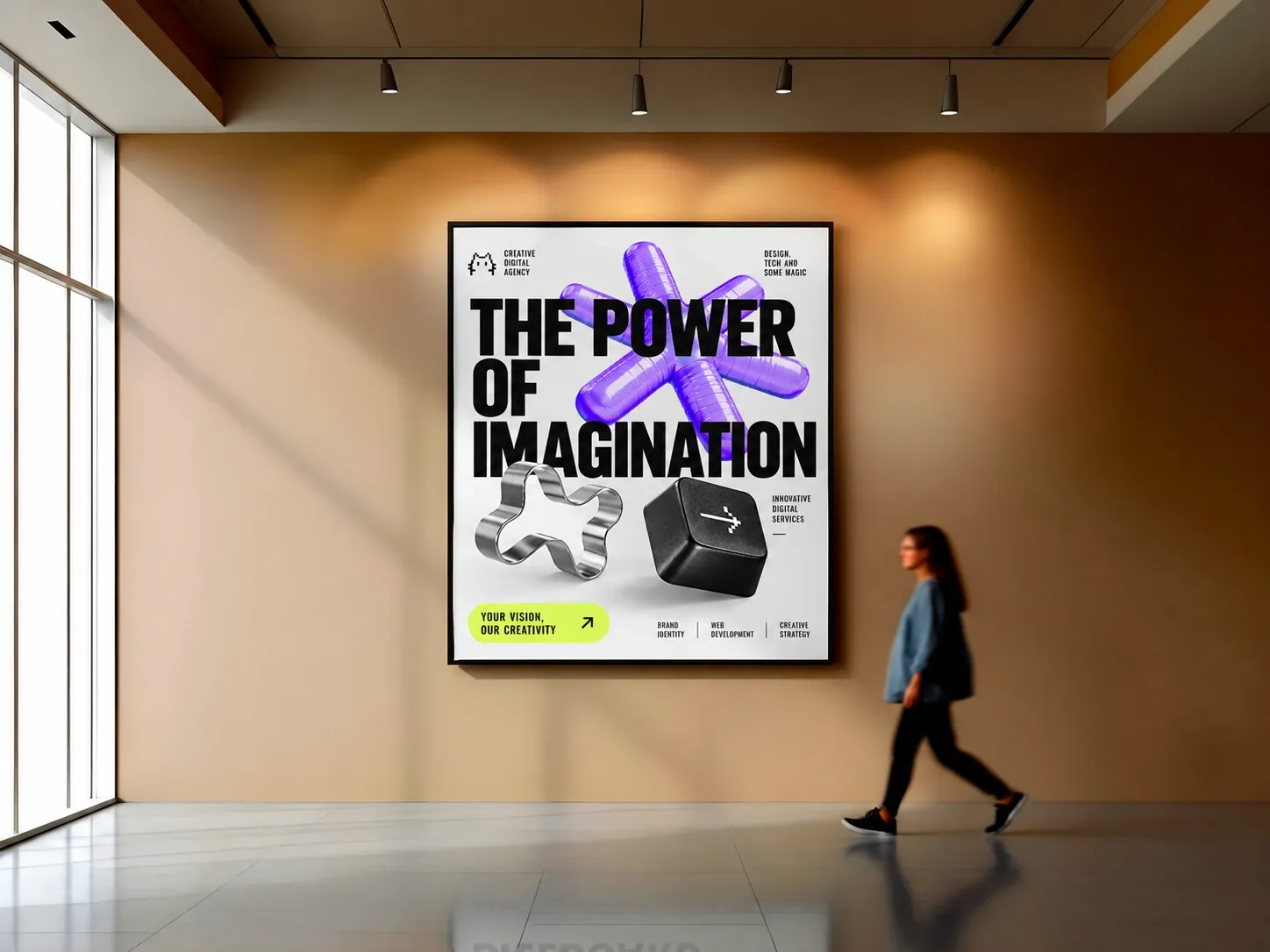 Une grande affiche « The power of imagination » sur le mur d'une galerie